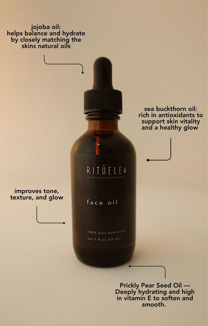 Rituel skincare face oil bottle with text about ingredients on a beige background