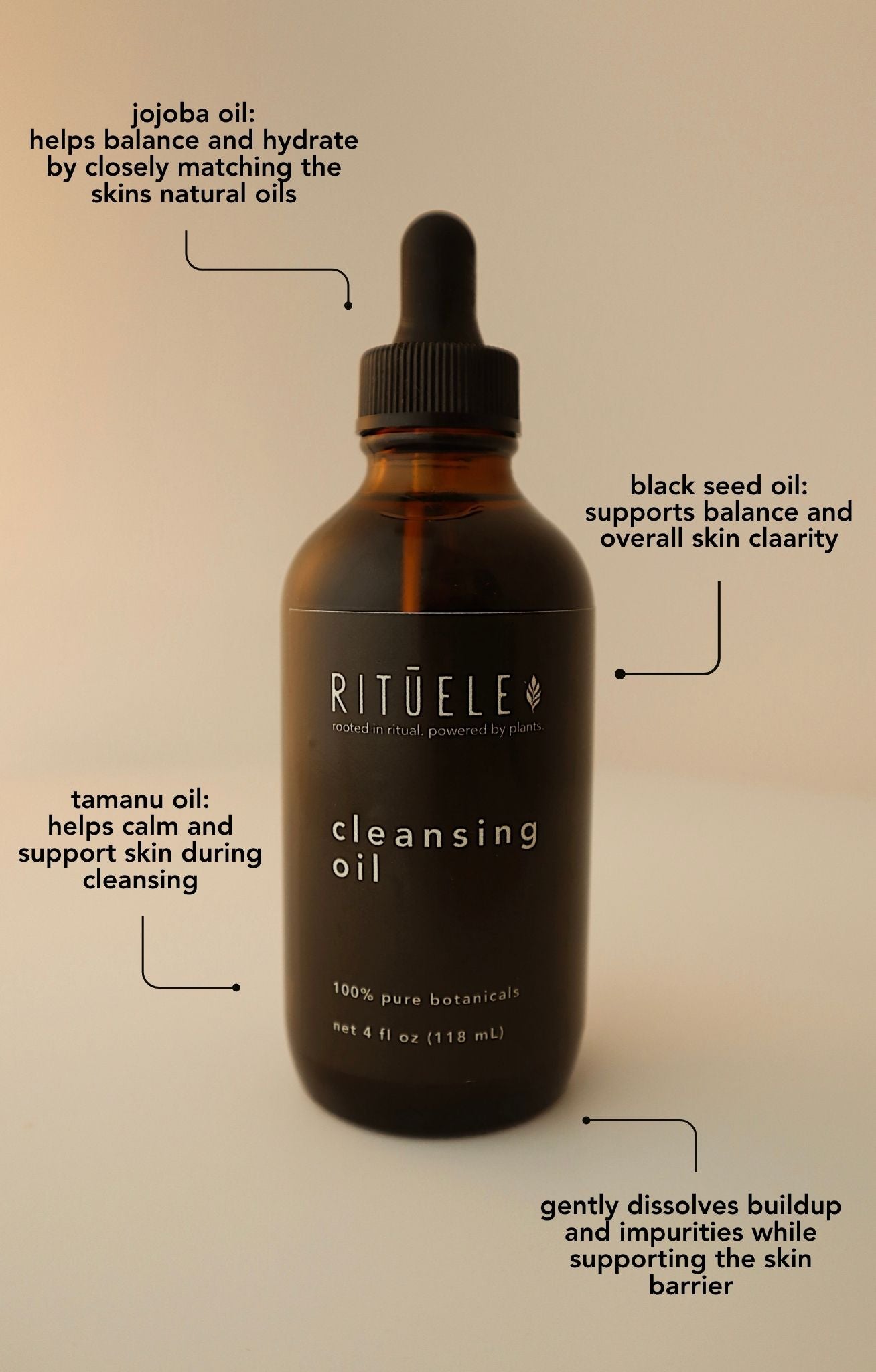 Rituelé cleansing oil bottle with text about oils on a beige background