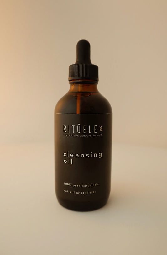 Bottle of rituele cleansing oil on a beige background