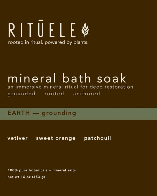 Ritūele mineral bath soak packaging with text on a brown background