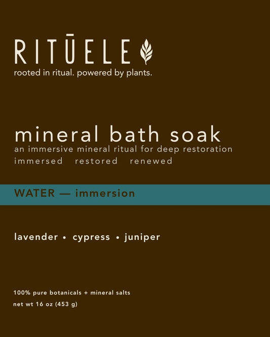 Ritūele mineral bath soak packaging with text on a brown background